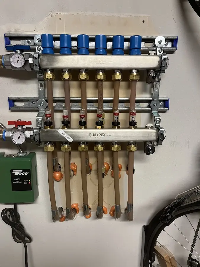 Plumber performing Gas Leak Detection at a residential property in Penfield